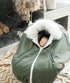 Gustine Housse et Poncho 3 en 1 pour le siège d'auto et porte-bébé En sortie Gustine baby carrier
